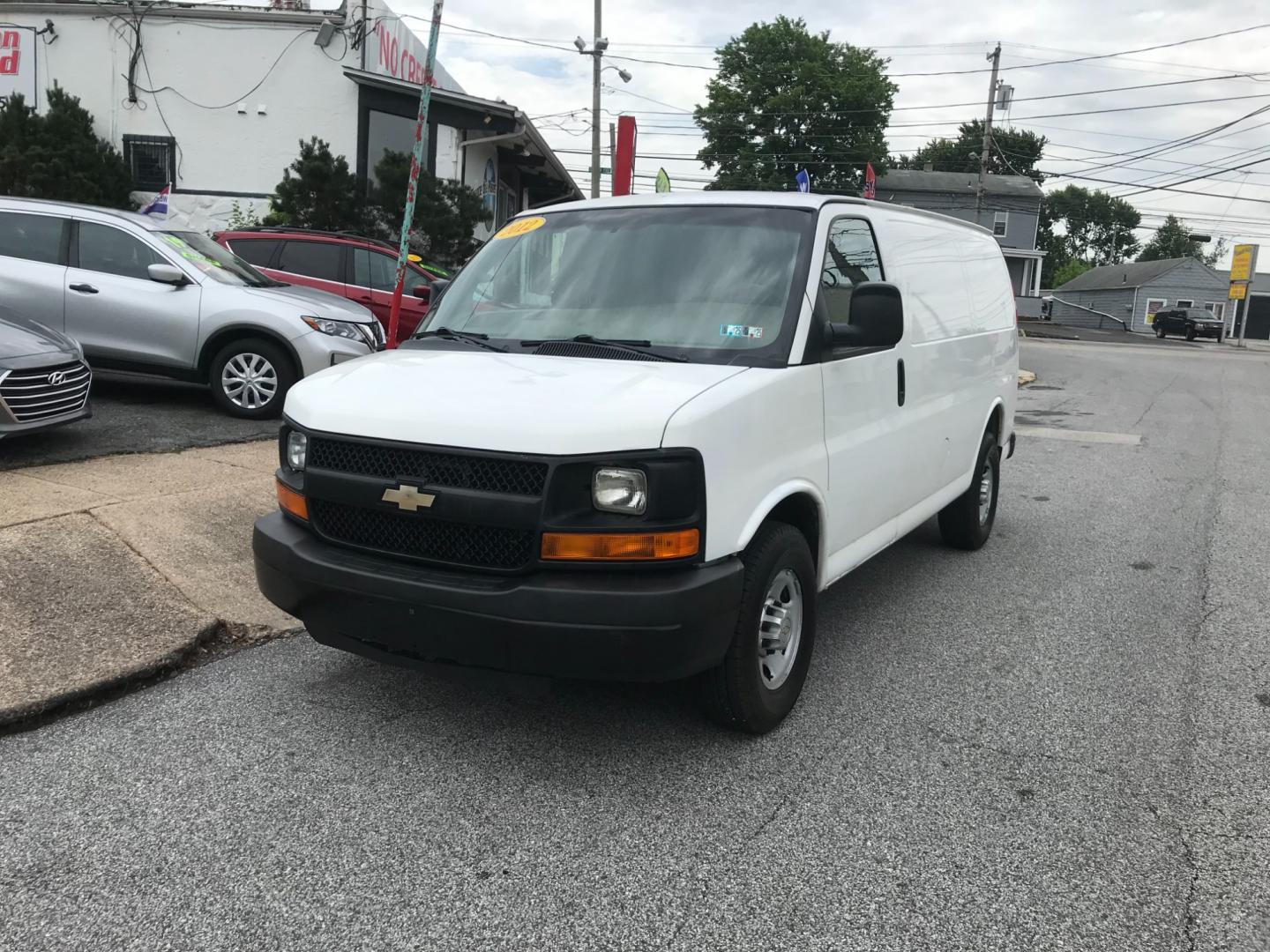 2012 White /Gray Chevrolet Express 2500 (1GCWGFCA3C1) with an 4.8 V8 engine, Automatic transmission, located at 577 Chester Pike, Prospect Park, PA, 19076, (610) 237-1015, 39.886154, -75.302338 - Photo#2